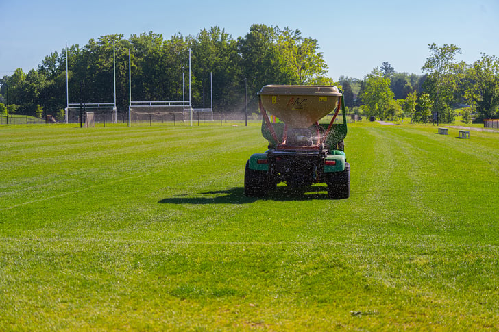 Sports field aeration and fertilization