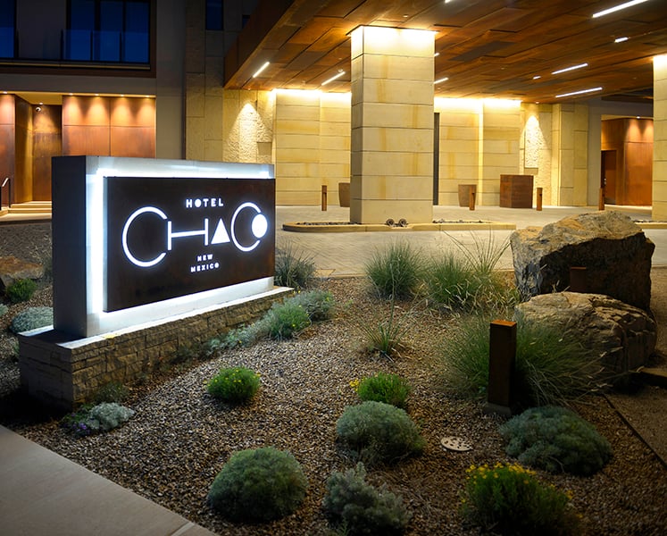 Hotel Chaco entrance planting flowers lighting