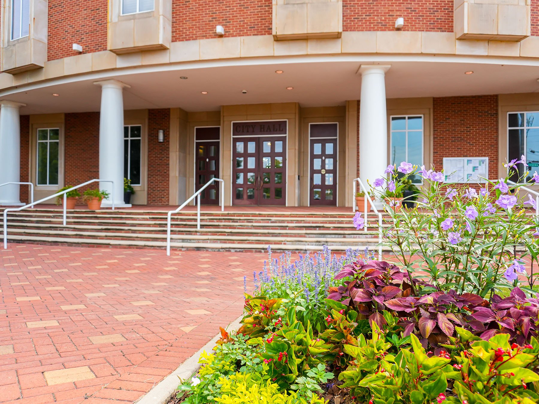 flowers in front of city center | Commercial Landscaping Yellowstone Landscape  