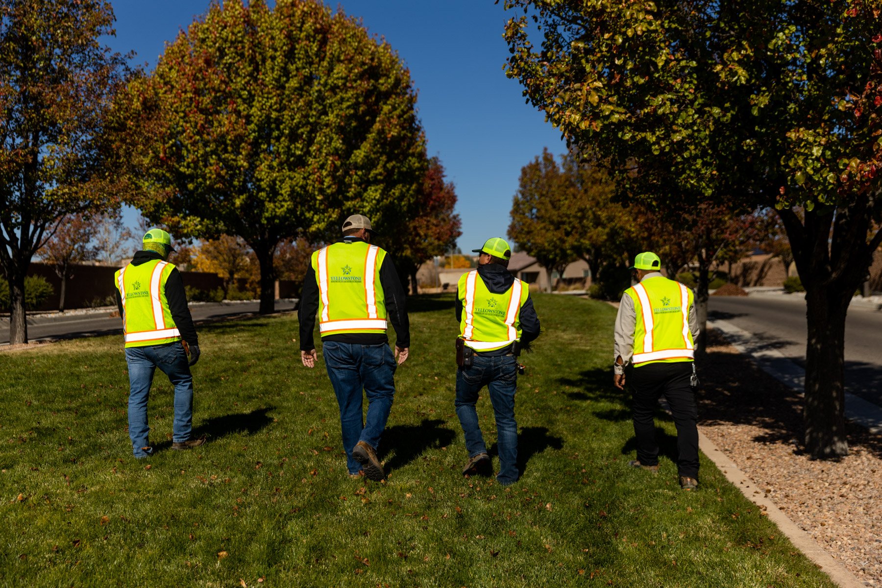 landscape crew inspecting property | Yellowstone Landscape 