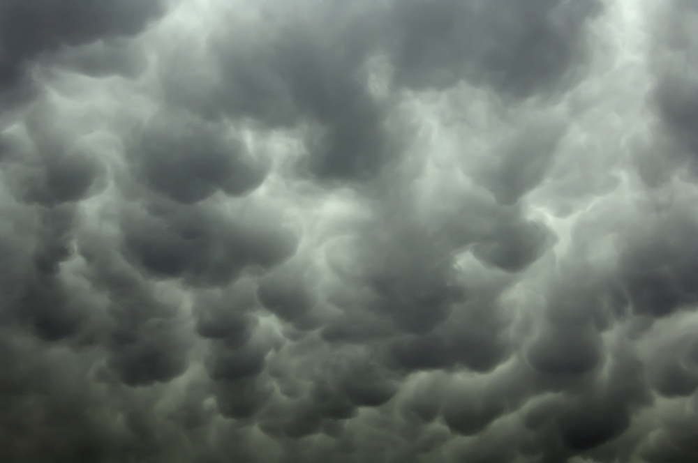 Storm clouds that could damage HOA property