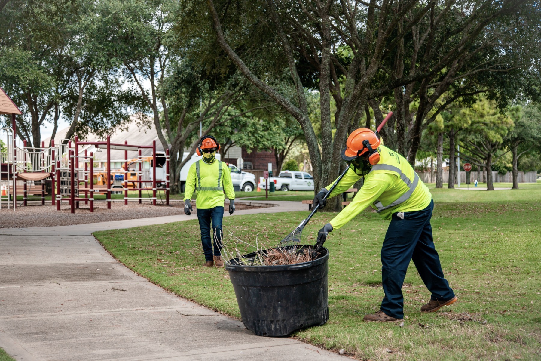 Commercial landscape crew cleaning up after a storm